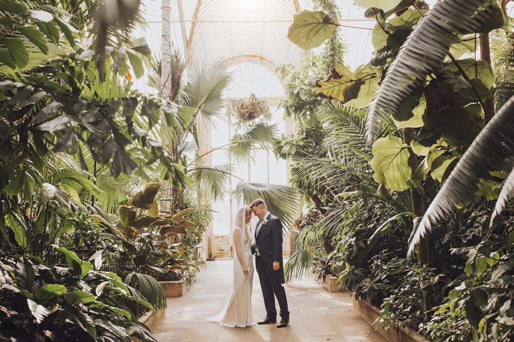 wedding couple in kew gardens conservatory