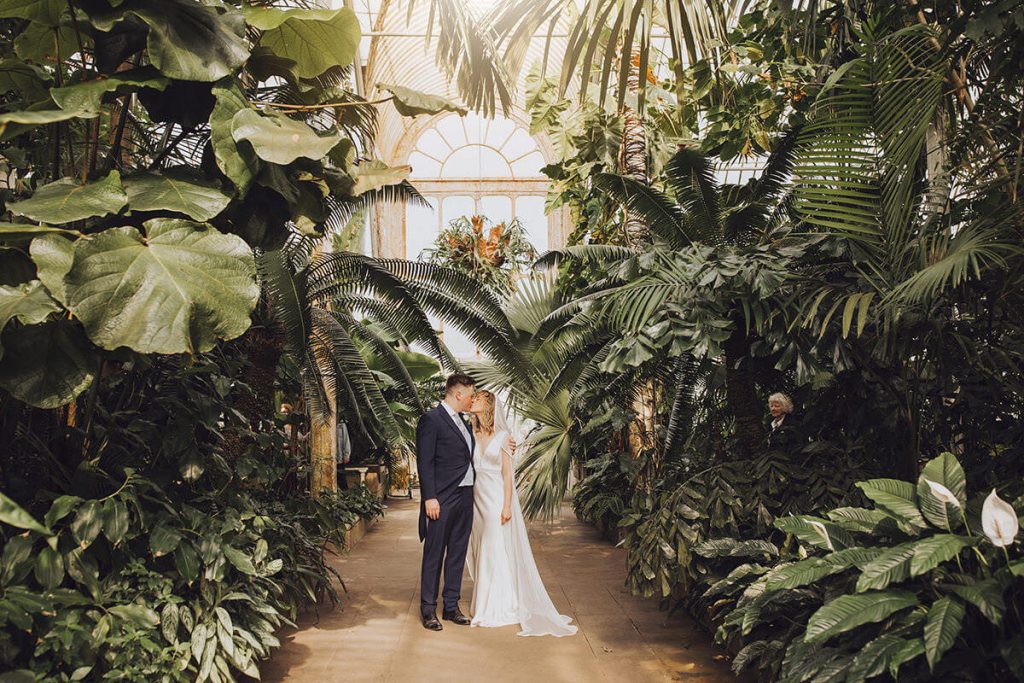 wedding couple in kew gardens conservatory