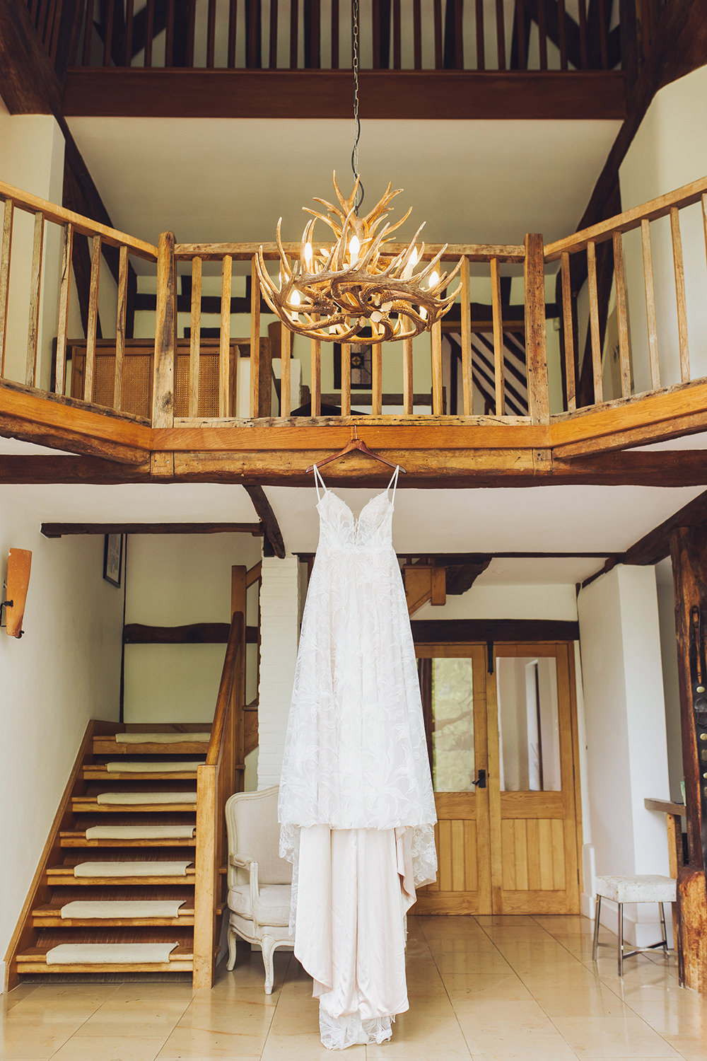 chafford park wedding dress hanging up in the bridal prep barn